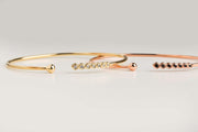 Solid Gold Seven-Diamond Bangle Bracelet