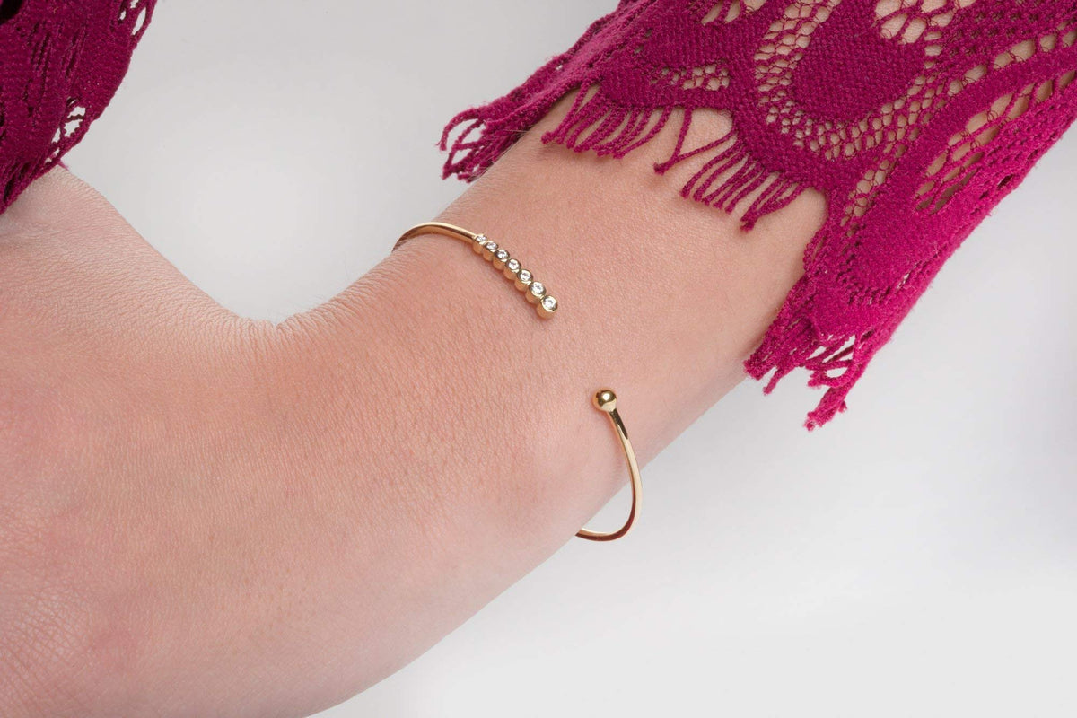 Solid Gold Seven-Diamond Bangle Bracelet