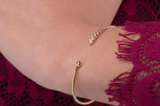 Solid Gold Seven-Diamond Bangle Bracelet